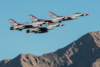 The USAF Thunderbirds over Sunrise Mtn. at Nellis AFB