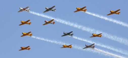 TEXAN FLYPAST: Four Harvards from the Canadian Harvard Aircraft Association flying a 12 ship tribute to the venerable North American T-6 Texan @ Thunder over Michigan, Detroit Willow Run Airport (KYIP), MI