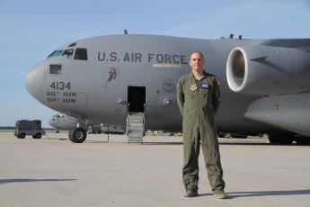 Sr Airman Corey Cochran  with the C-17