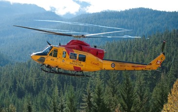 A Canadian Forces CH-146 Griffon helicopter from 424 Search and Rescue (SAR) Squadron, Trenton, Ontario, lands after a SAR mission during Exercise SPARTAN RINGS near Whistler, BC.
In preparation for securing the Vancouver 2010 Olympic and Paralympic Winter Games, Exercises PEGASUS GUARDIAN 3 and SPARTAN RINGS are taking place in the Vancouver and Whistler areas from October 19 to 23, 2009. These full-scale police and Canadian Forces exercises are focused on validating the readiness of the Royal Canadian Mounted Police-led V2010 Integrated Security Unit (ISU) and test communications, planning and interoperability among various law enforcement agencies and the Canadian Forces.
At the conclusion of PEGASUS GUARDIAN 3 and SPARTAN RINGS, the V2010 ISU and its security partners will prepare for the final Privy Council of Canada-led confirmation exercise. Exercise GOLD will be held from November 2 to 6, 2009.

Photo credit: Sergeant Frank Hudec, Canadian Forces Combat Camera

Courtesy of the RCAF
