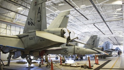 F-18Es of VFA-31 Undergoing Operational Maintenance - aside from the high ceilings, packed similar to a carrier hangar.  Practice as you work...