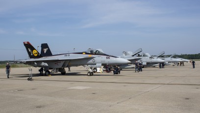 F/A-18E's of VFA-31 Tomcatters final pre-flight prior to morning launch, each aircraft has multiple ground crew members doubled up in training.