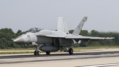 F/A-18E of VFA-81 Sunliners launching for training sortie against VFA-31