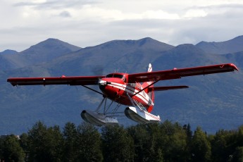 Theis bush plane, the de Havilland Canada DHC-3 Vazar Turbo Otter, departs on a flight to Alaska's back country.