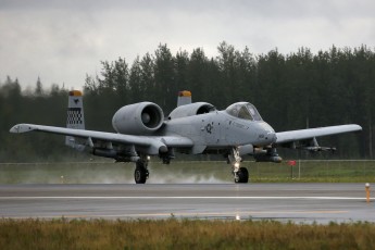 This Blue Air Fairchild Republic A-10C Thunderbolt II, from the 25th FS "Flying Elvises" at Osan AB, South Korea, launches in heavy rain at Eielson AFB.