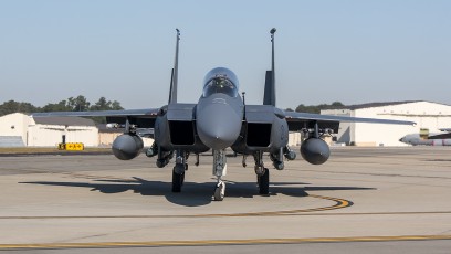 F-15E with 12 practice bombs leaving EOR for launch.