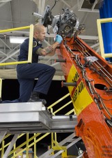 Phillip Johnson AMT3 working night shift to "rebuild" a very torn down USCG Sikorsky MH-60T