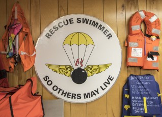 USCG Air Station Elizabeth City, NC - one of many walls of life jackets memoralizing rescues & saved lives over many years, and the Rescue Swimmer Creed.