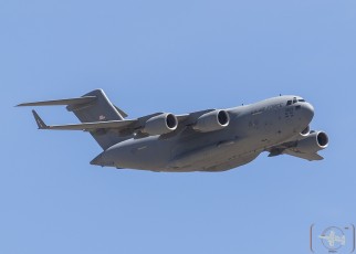 Air Mobility Command C-17A of the 62nd AW/446th AW McChord AFB, WA flies over Keno Airfield on the NTTR during Joint Forcible Entry Exercise (June 2016).