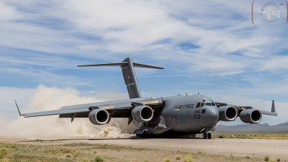 Air Mobility Command C-17A of the 436th Airlift Wing, Dover, DE kicks up the dust during landing rollout at Keno Airfield on the NTTR during Joint Forcible Entry Exercise (June 2016).