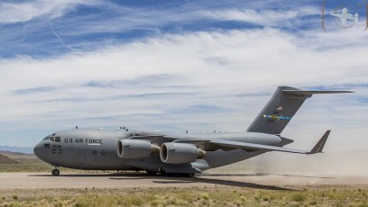 Air Mobility Command C-17A of the 436th Airlift Wing, Dover, DE taxis at Keno Airfield on the NTTR during Joint Forcible Entry Exercise (June 2016).