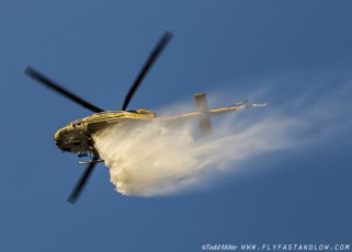 Bell 412 makes water drop on the Azusa Fire on the hills North of Los Angeles June 20, 2016