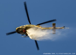Bell 412 makes water drop on the Azusa Fire on the hills North of Los Angeles June 20, 2016