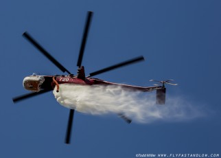 Sikorsky CH-54B laying down flowing "locks" of  water on the Azusa Fire on the hills North of Los Angeles June 20, 2016