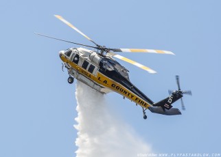 Sikorsky S-70A Firehawk wraps up another water drop on the Azusa Fire on the hills North of Los Angeles June 20, 2016