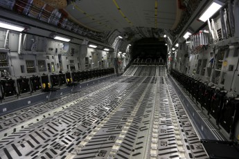 The cargo compartment is 88 feet (27 m) long by 18 feet (5.5 m) wide by 12 feet 4 inches (3.76 m) high and the cargo is loaded through a large aft ramp. 