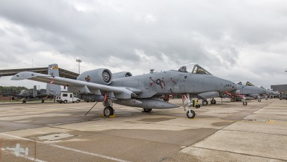 A-10Cs of the Maryland Air National Guard 175 WG, 104th FS wait in line under dark skies.