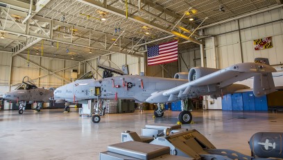 A-10Cs of the 104th FW sitting in the pristine 175th WG Maryland Air National Guard hangar .