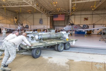 Maryland Air National Guard teamwork moves 4000lbs (2 x MK-84) of concrete practice bombs into place in the hangar of the 104th FS, 175th WG.