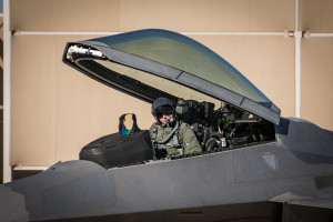 Captain John "Taboo" Cummings prepares to depart for an F-22 Demo/Heritage Flight training flight