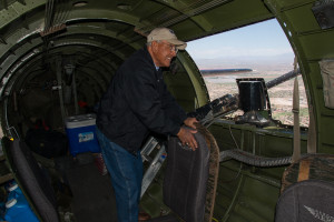 Carlos Salas enjoying the view on a flight on B-17 "Nine-O-Nine"
