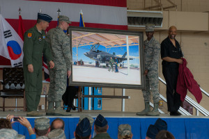 The unveiling of the new 56 FW lithograph. The artist, Charles Lilly is on the right. 