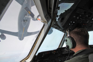 Taking on Fuel - The pilot guides the KC-10 up towards the KC-135