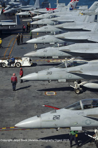 A line of Boeing F/A-18 E/F Super Hornets on the USS George Washington
