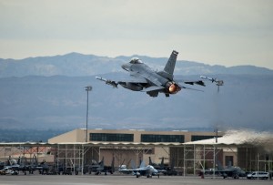 An F-16 Fighting Falcon assigned to the 457th Fighter Squadron, Naval Air Station Fort Worth Joint Reserve Base, Texas, takes off during Red Flag 15-4 at Nellis Air Force Base, Nev., Aug. 25, 2015. All four U.S. military services, their Guard and Reserve components and the air forces of other countries participate in each Red Flag exercise. (U.S. Air Force photo by Senior Airman Thomas Spangler)
