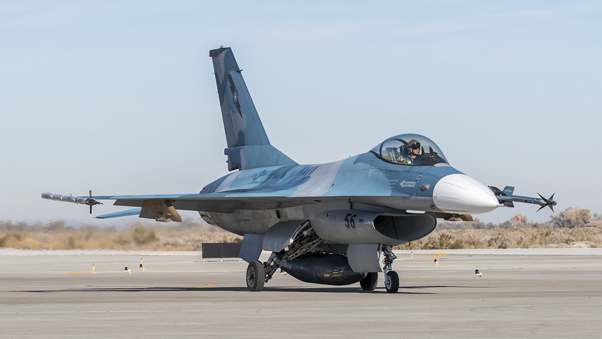 F-16A Aggressor used in TOPGUN school taxis to launch - NSAWC