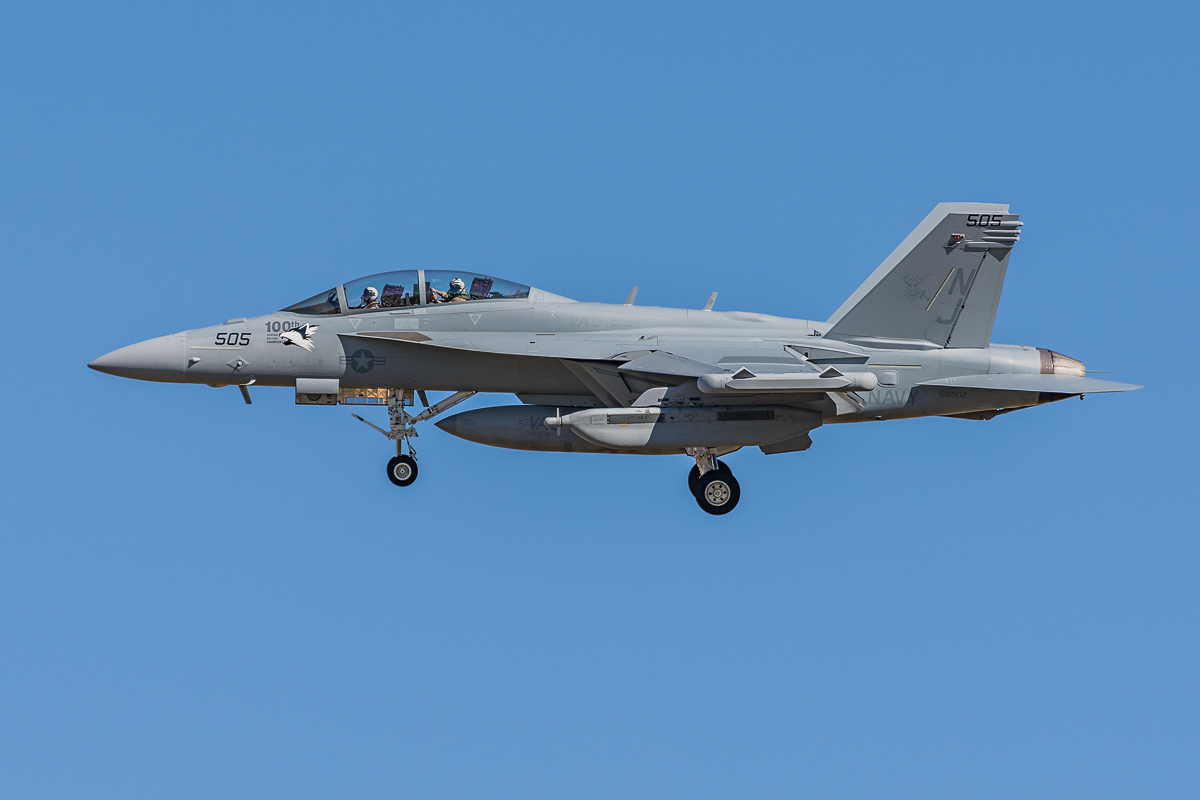 The 100th production Boeing EA-18G Growler from Electronic Attack Squadron 129 (VAQ-129) "Vikings" arrives in the late AM sun. 