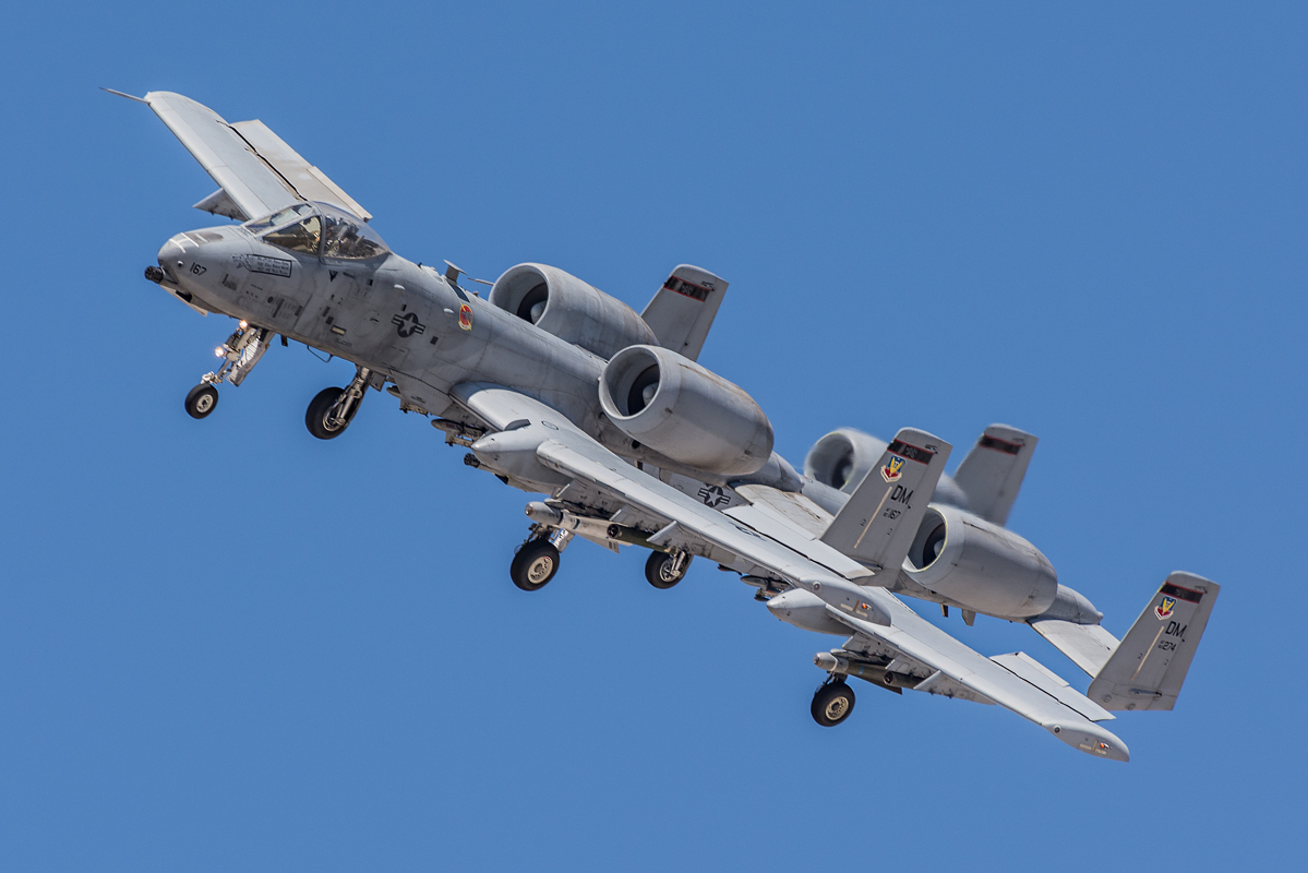 A pair of A-10s in a tight formation return to Davis-Monthan AFB after a morning training mission