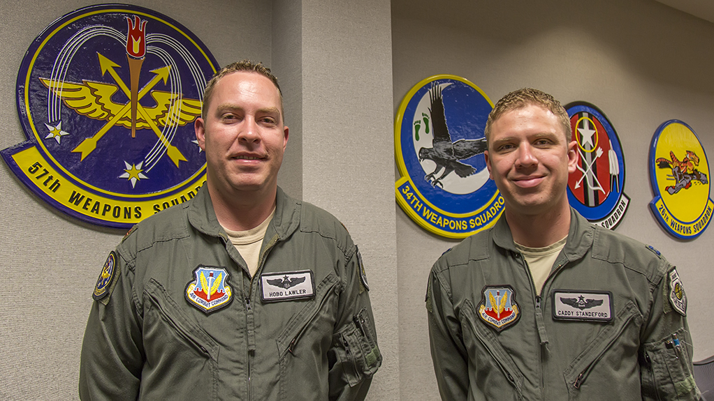 USAF Weapons School Instructors, Maj. Chris Lawler (57th Weapons Squadron, McGuire AFB C-17 pilot and JFE 2016-A Exercise Lead) and Capt. Andrew Standeford (29th Weapons Squadron, Little Rock AFB C-130 pilot)